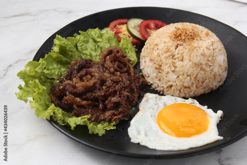 Freshly cooked Filipino food called Tapsilog Freshly cooked Filipino food called Tapsilog