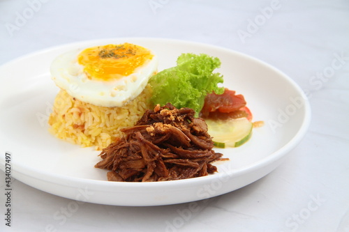 Freshly cooked Filipino food called Pulledporksilog photo