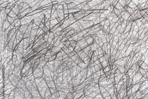 Abstract chaotic texture drawn by hand. Dirty background with pencil messy stroke.