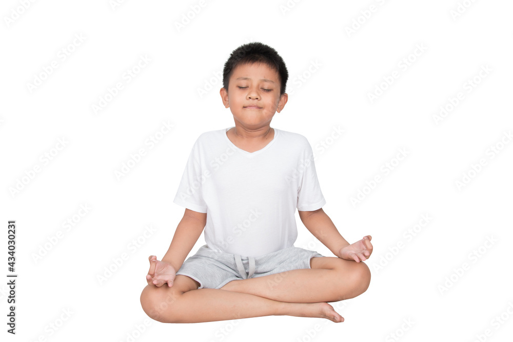 Asian children sit for meditation. calmness and relax Asian children sit for meditation. calmness and relax