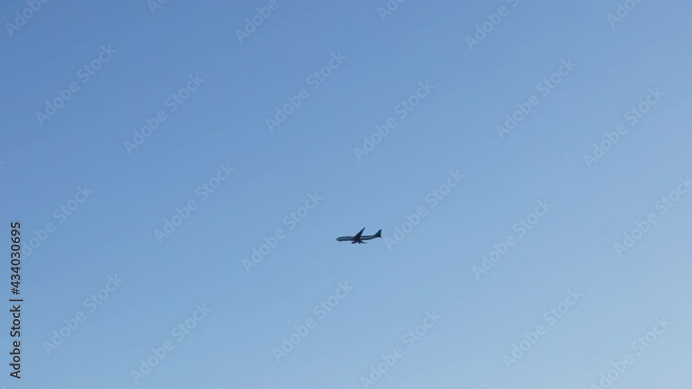 A plane flying across the screen A plane flying across the screen