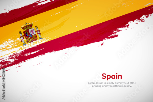 Brush painted grunge flag of Spain country. Hand drawn flag style of Spain. Creative brush stroke concept background