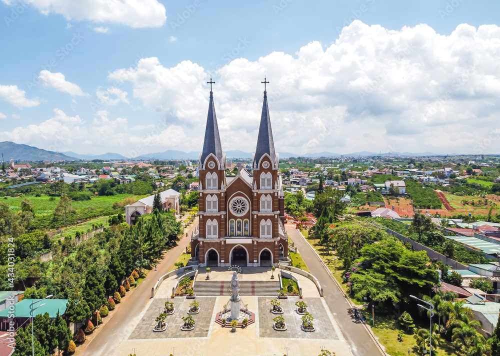 Fototapeta premium Aerial view of Church of the Holy Mother (another name is Thanh Mau church) in Bao Loc Town, Lam Dong, Vietnam.