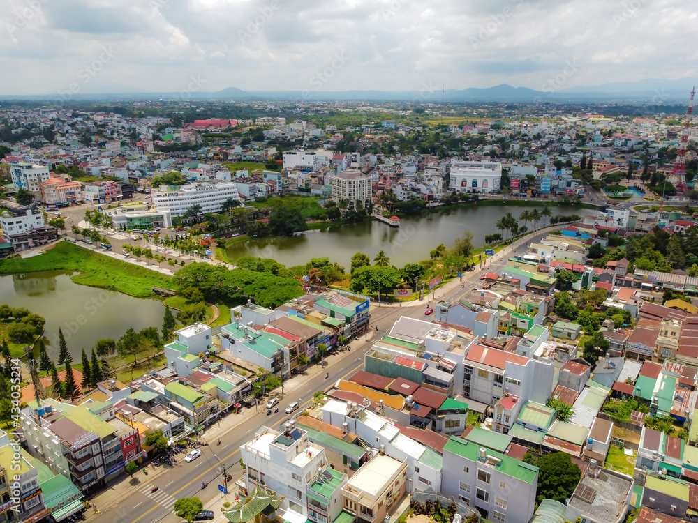 Aerial view of small Dong Nai lake - a central lake in Bao Loc city, Lam Dong province, Vietnam. It is a nice beside big TV tower.