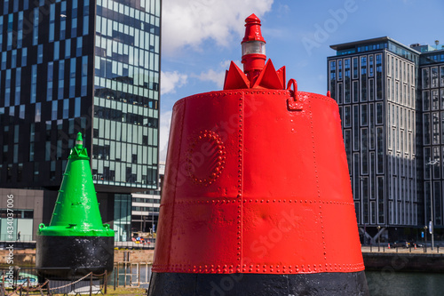 Red and green buoys on the Liverpool waterfront photo