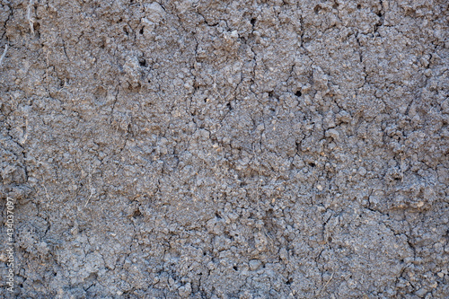 Abstract black background. Ground surface texture. Soil close-up. photo