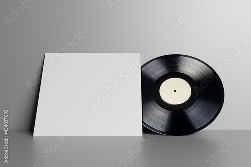 Blank white vinyl LP record on white wall. 3D rendering.