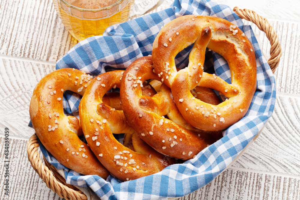 Lager beer mug and fresh baked homemade pretzel Lager beer mug and fresh baked homemade pretzel