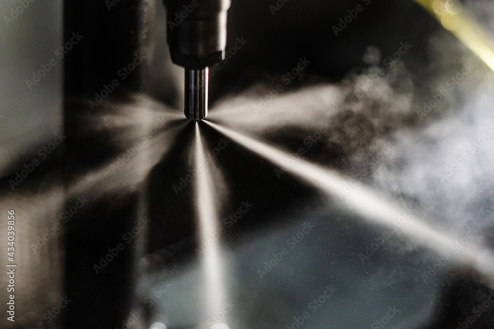 Fuel injector in action spraying fast passing the test 素材庫相片 Adobe Stock