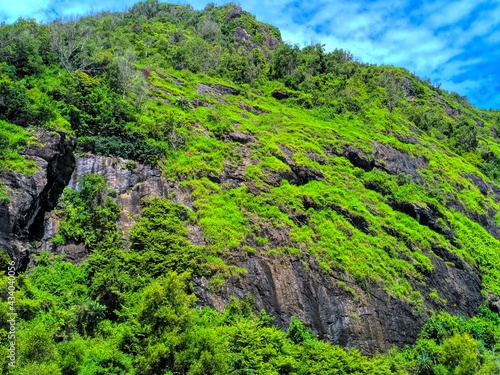 Beautifull green hill against blue sky