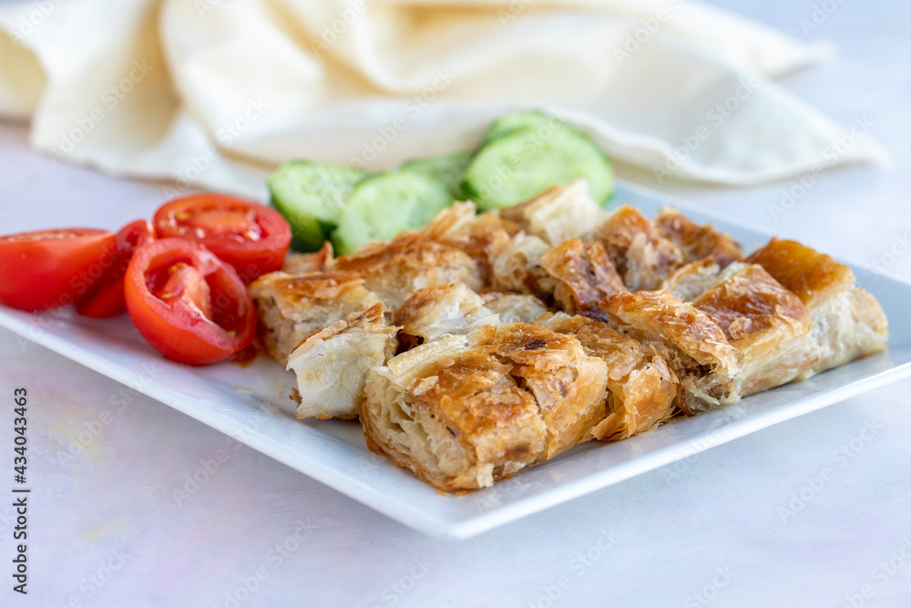 Turkish style meat stuffed filo dough borek served kol boregi. Turkish style meat stuffed filo dough borek served kol boregi.