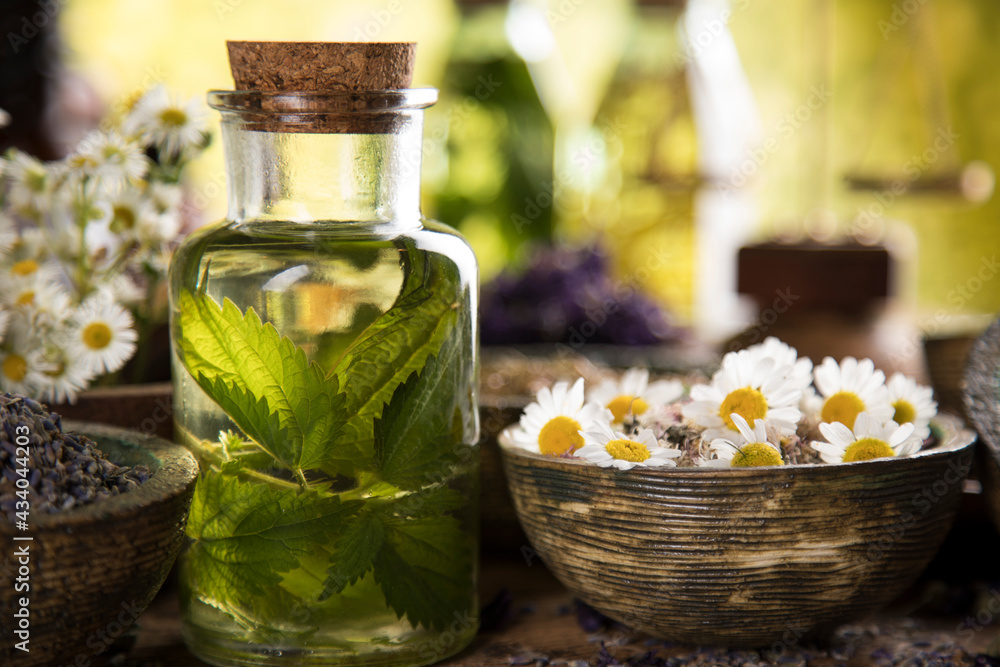 Natural medicine and mortar, healing herbs background Natural medicine and mortar, healing herbs background