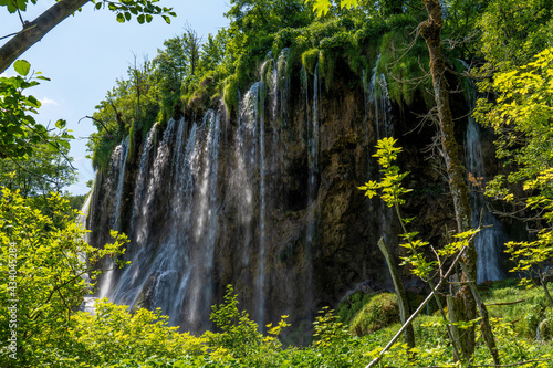 Waterfall with turquoise water in the Plitvice Lakes National Park  Croatia.