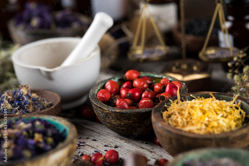 Natural remedy, mortar and herbs Natural remedy, mortar and herbs