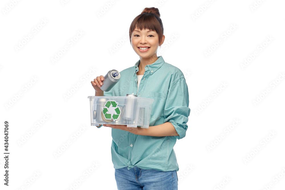 metal recycling, waste sorting and sustainability concept - smiling young asian woman holding plastic box with tin cans over white background metal recycling, waste sorting and sustainability concept - smiling young asian woman holding plastic box with tin cans over white background