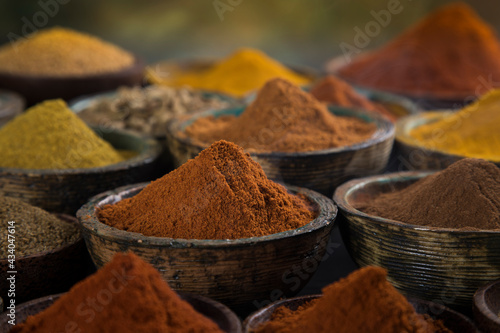 Spices and herbs selection on wooden background