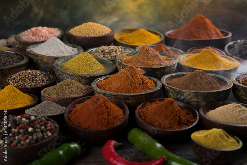 Colorful spices in bowl background