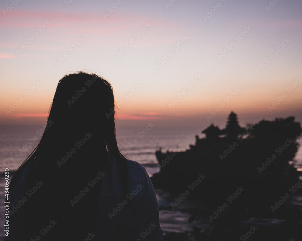 silhouette of a person on the beach