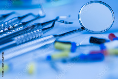 Dentist equipment on blue background