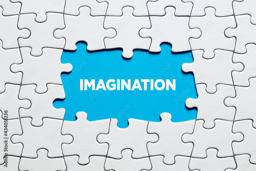 The word imagination surrounded by jigsaw puzzle. To increase or improve creativity and imagination in education or business. The word imagination surrounded by jigsaw puzzle. To increase or improve creativity and imagination in education or business.