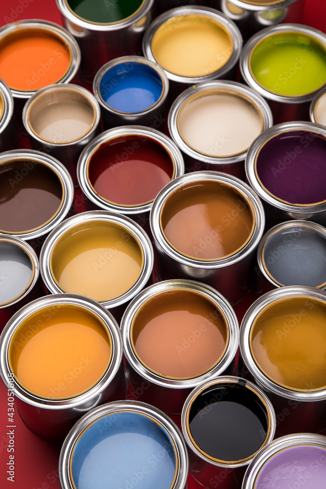 Fototapeta premium Full Buckets of rainbow colored oil paint