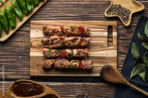 Mount of turkey Moorish skewer with peppers, bbq sauce and peppercorns