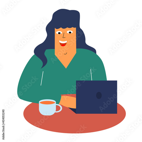 A cheerful girl is sitting in a cafe with a laptop and drinking coffee. Work, study in a cafe. Freelancer at work. The girl drinks coffee