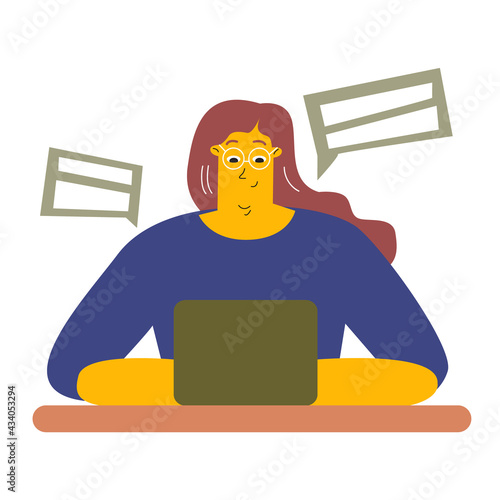 A cute girl with glasses is sitting with a laptop. Online communication, working remotely, freelancing, conducting business correspondence. The girl is sitting in the chat