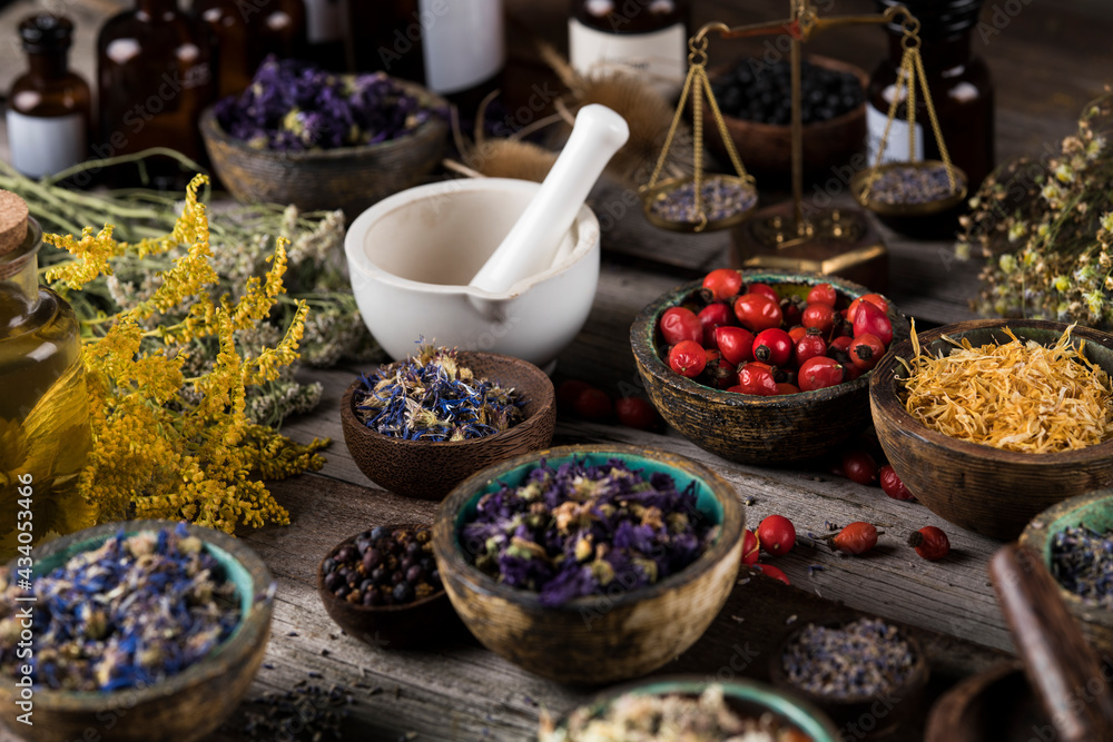 Natural remedy, mortar and herbs Natural remedy, mortar and herbs