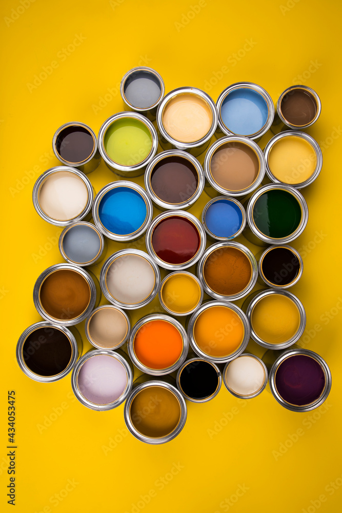 Buckets full of rainbow colored oil paint Buckets full of rainbow colored oil paint
