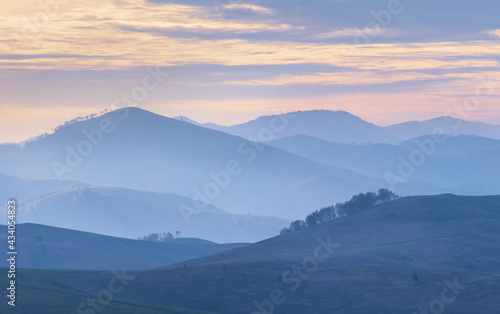 Mountains and hills in the morning haze © Valerii