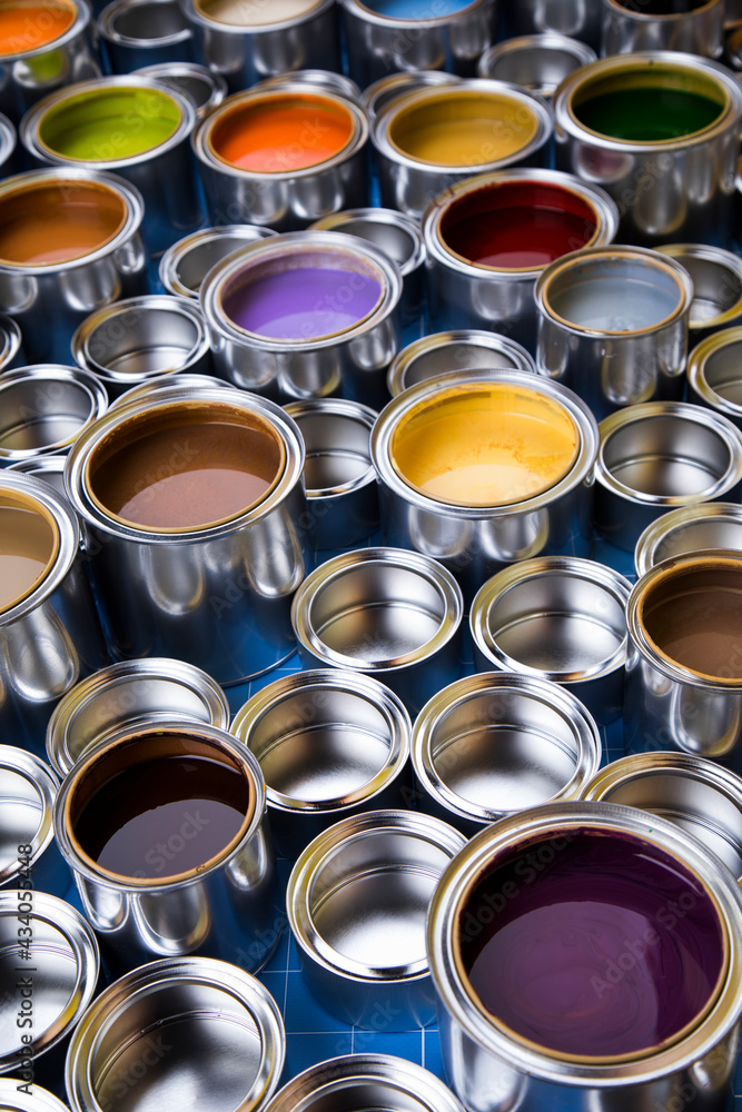 Group of tin metal cans with color paint Group of tin metal cans with color paint