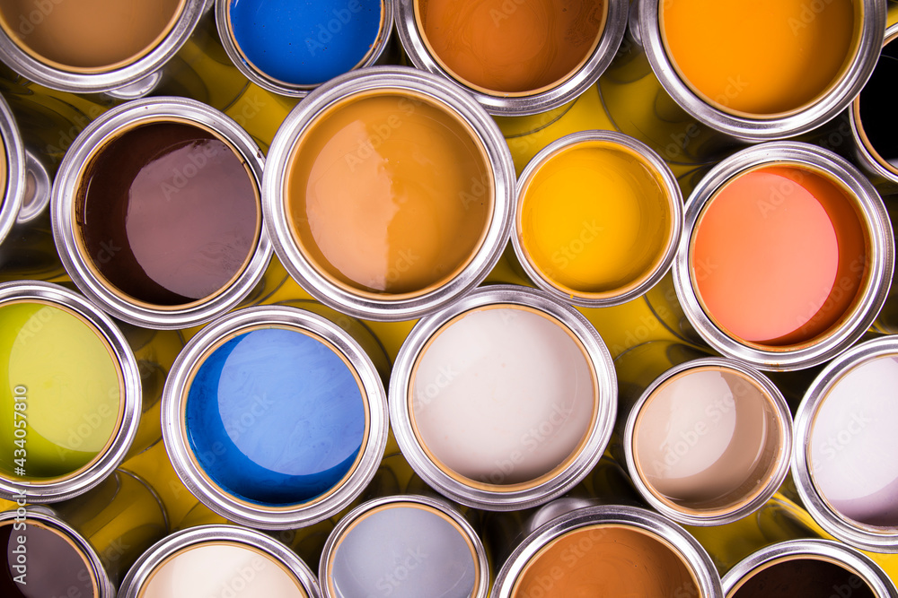 Buckets full of rainbow colored oil paint Buckets full of rainbow colored oil paint