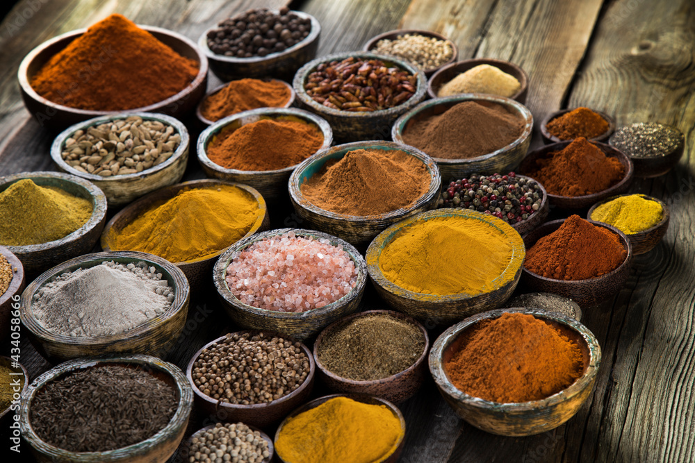 Aromatic spices on wooden background Aromatic spices on wooden background