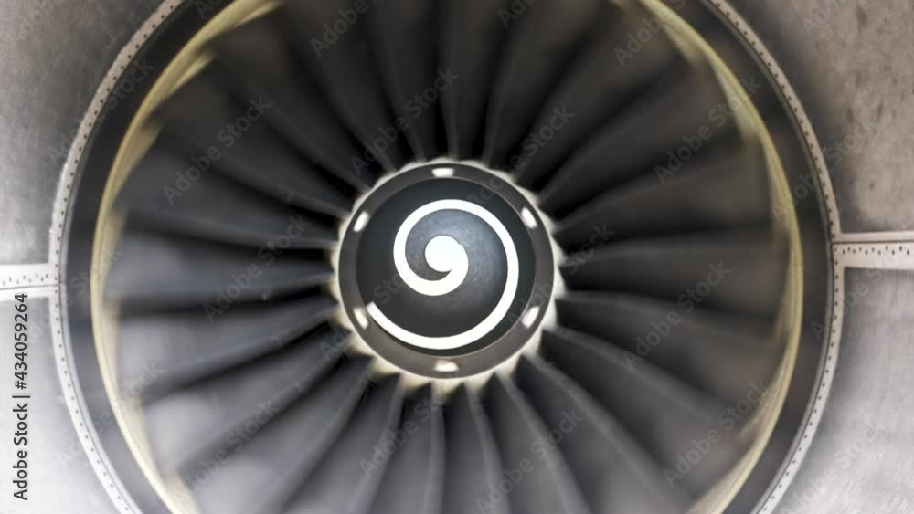 The rotation of airplane engine. Front view of aircraft engine turning. Jet engine rotation.4K