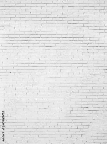 Old Brick wall painted with white paint.