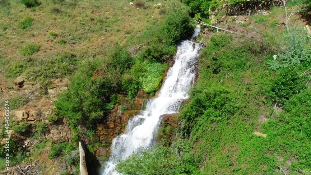 Beautiful waterfall in the forest with water reflections. Aerial 4k footage of the waterfall in the valley. The environment. Best hiking trails. Middle East region. Summer in Lebanon. Cascade view Beautiful waterfall in the forest with water reflections. Aerial 4k footage of the waterfall in the valley. The environment. Best hiking trails. Middle East region. Summer in Lebanon. Cascade view
