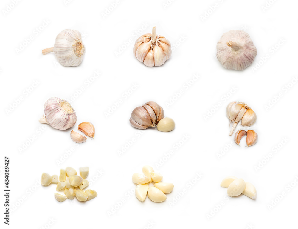 Set of fresh whole and sliced garlic isolated on white background. Image on top view. Set of fresh whole and sliced garlic isolated on white background. Image on top view.