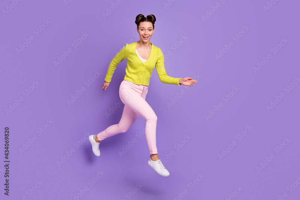 Full size photo of young charming happy good mood excited girl running in air isolated on purple color background Full size photo of young charming happy good mood excited girl running in air isolated on purple color background