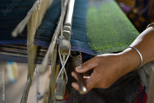 Close-up Shot of Traditional Hand-weaving with Eldery Woman Hands.