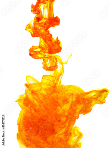 A yellow, orange cloud of ink in water isolated on a white background.