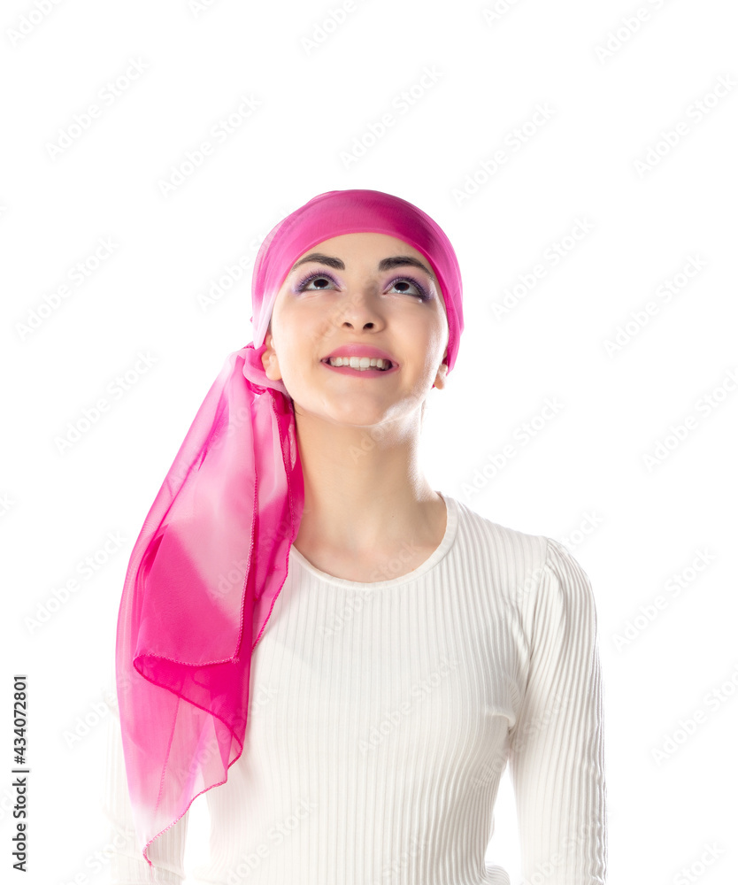 Young brunette woman wearing pink head scarf Young brunette woman wearing pink head scarf