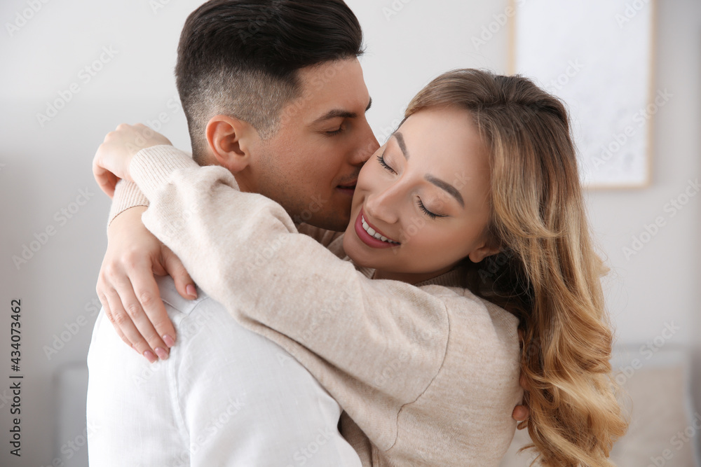 Lovely couple enjoying time together at home Lovely couple enjoying time together at home