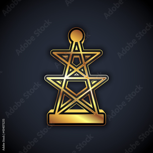 Gold Electric tower used to support an overhead power line icon isolated on black background. High voltage power pole line. Vector