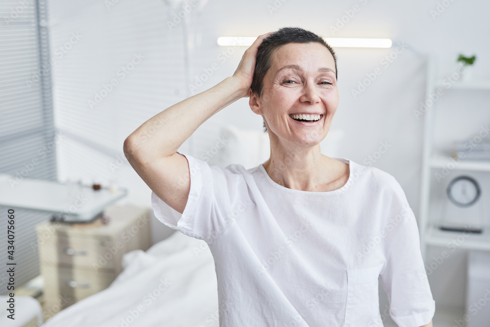 Fototapeta premium Portrait of happy mature woman smiling at camera she recovering from illness