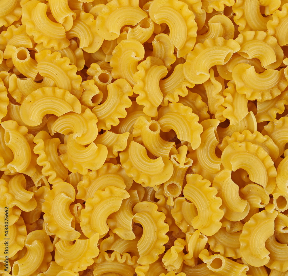 Pasta cornetti creste pile background and texture Pasta cornetti creste pile background and texture