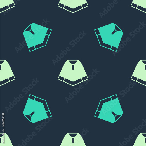 Green and beige Traditional mexican poncho clothing icon isolated seamless pattern on blue background. Vector