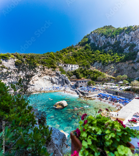 Fototapeta Naklejka Na Ścianę i Meble -  Aerial view of a pristine hidden beach in Italy