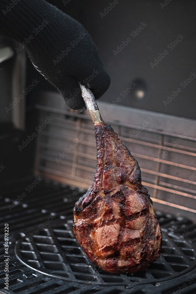 Tomahawk steak on a gas grill Stock Photo Adobe Stock