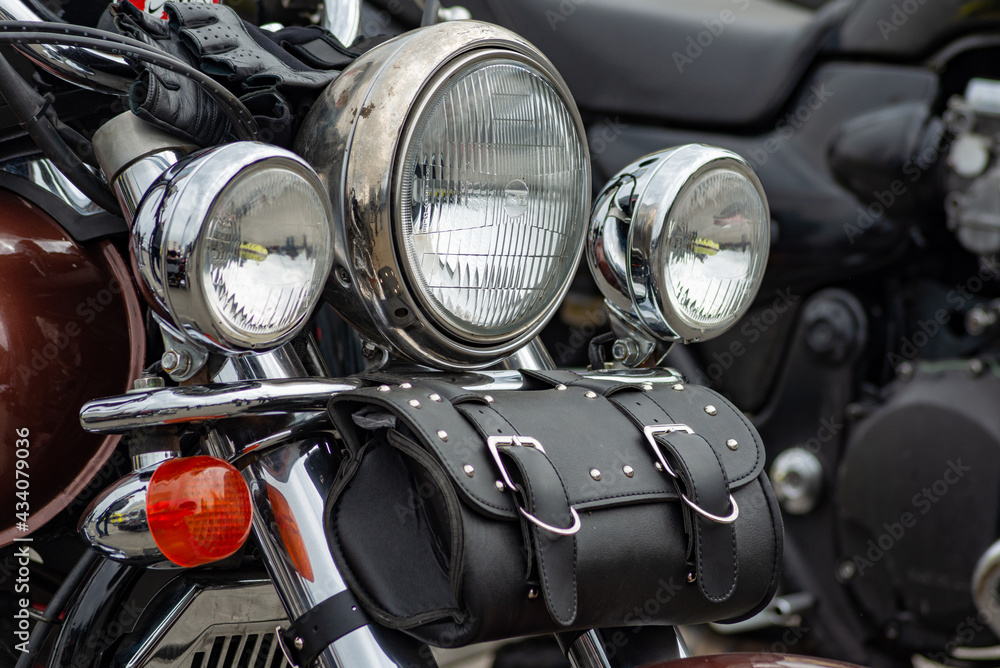 Motorcycle headlight in perspective Close up photo
